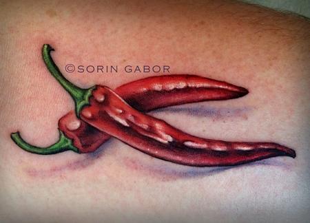 Sorin Gabor - Realistic hot peppers color tattoo